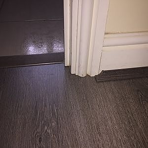 Cutting the door frames , preparation for laminate flooring